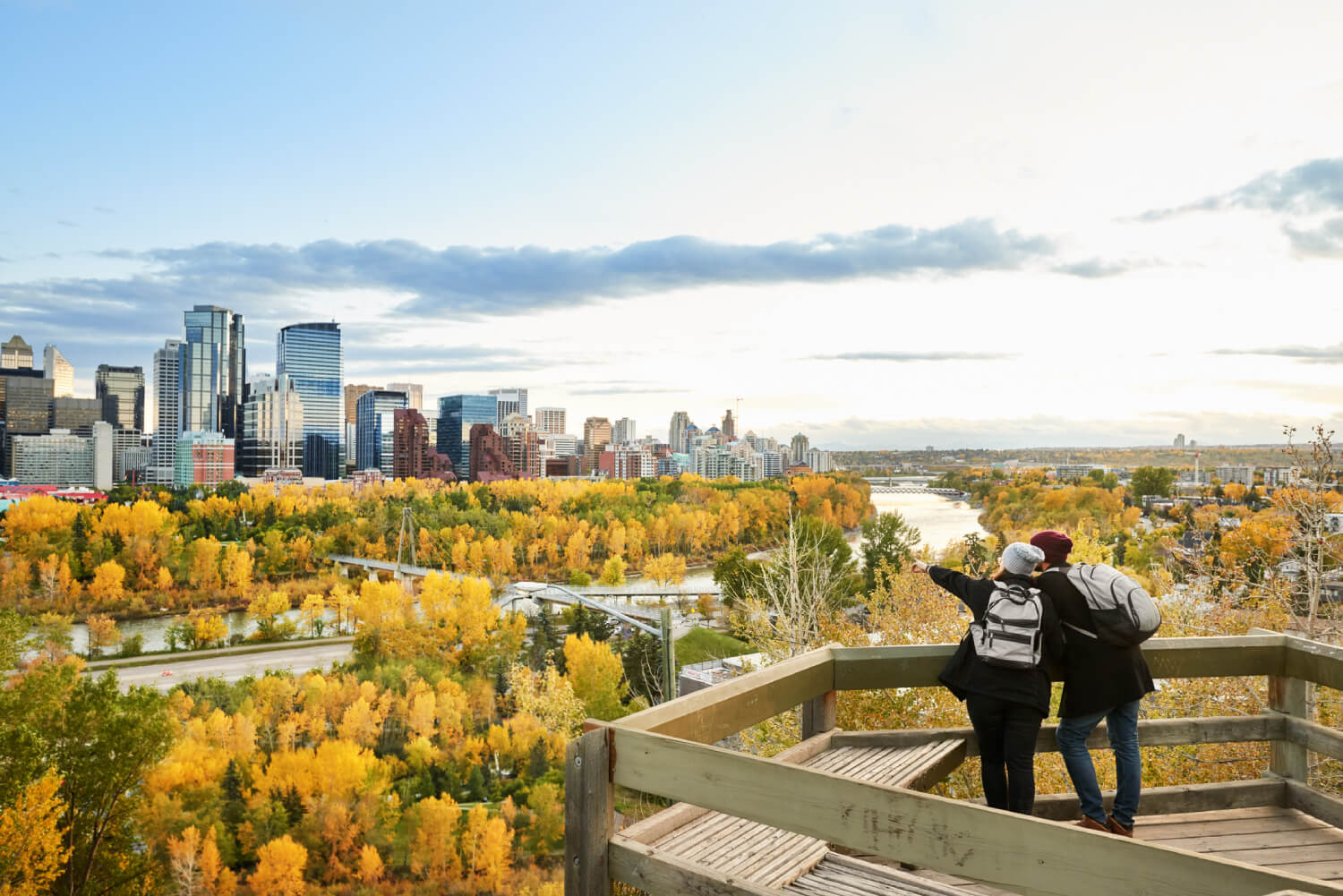 a couple looking at the city of Calgary, Canada