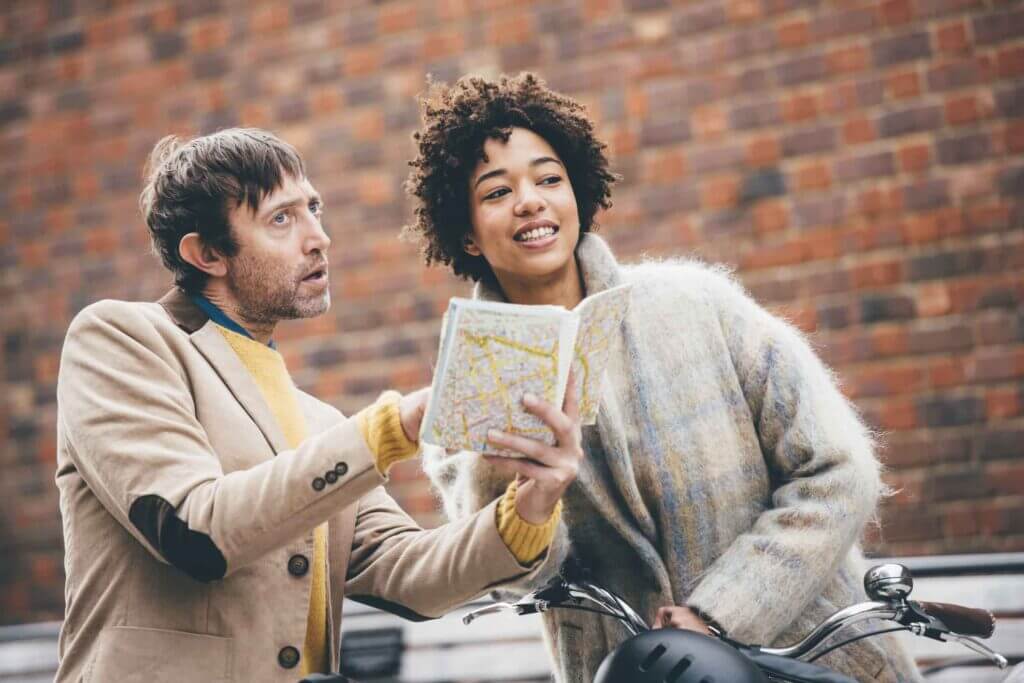 a couple discussing street directions