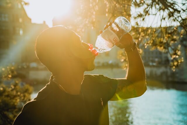 a man drinking water