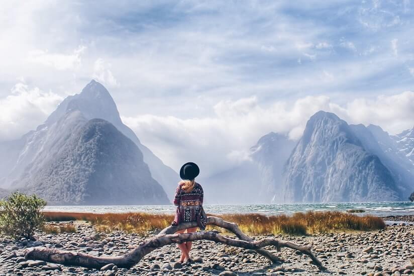 woman looking at natural surroundings in New Zealand