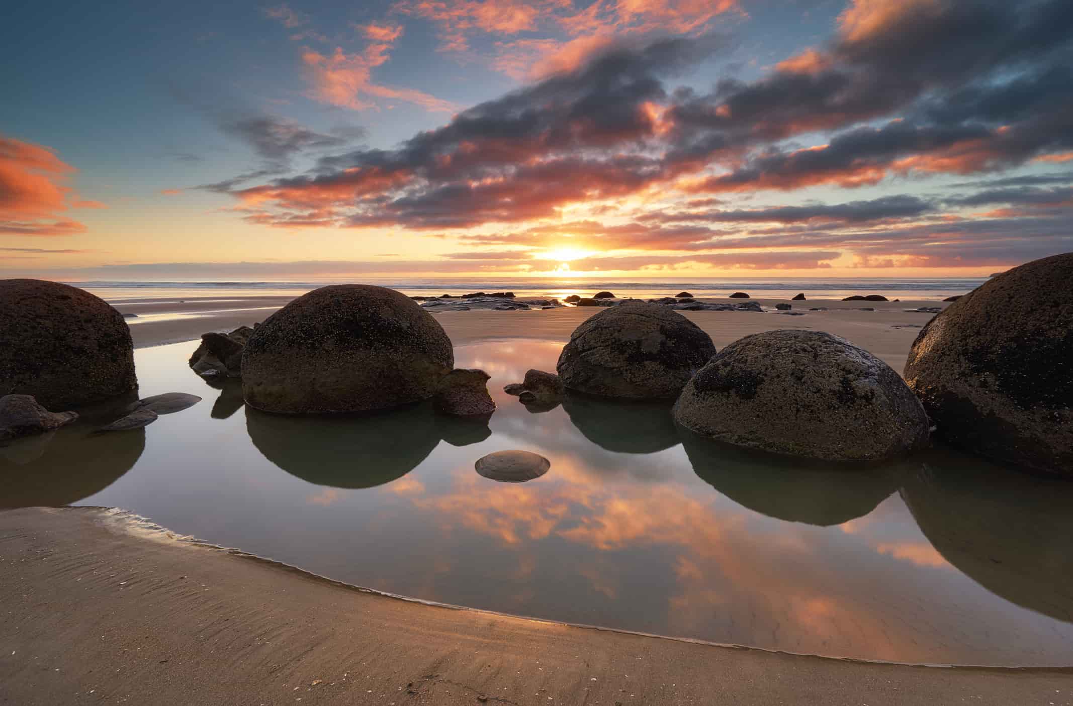 Moeraki Boulders Sunrise and Reflection, New Zealand