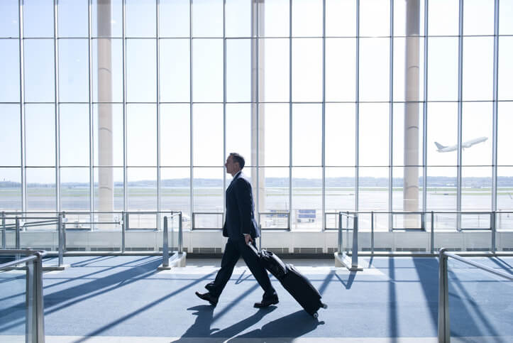 businessman carrying a suitcase