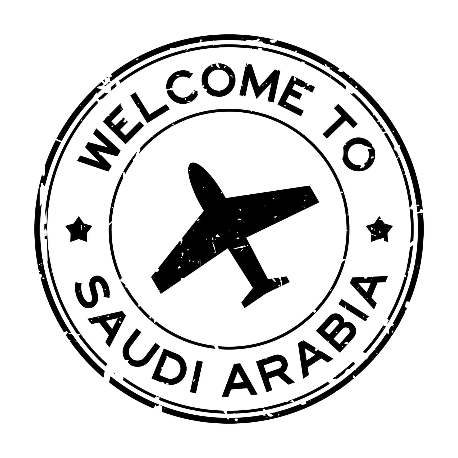 Welcome to Saudi Arabia sign with an airplane