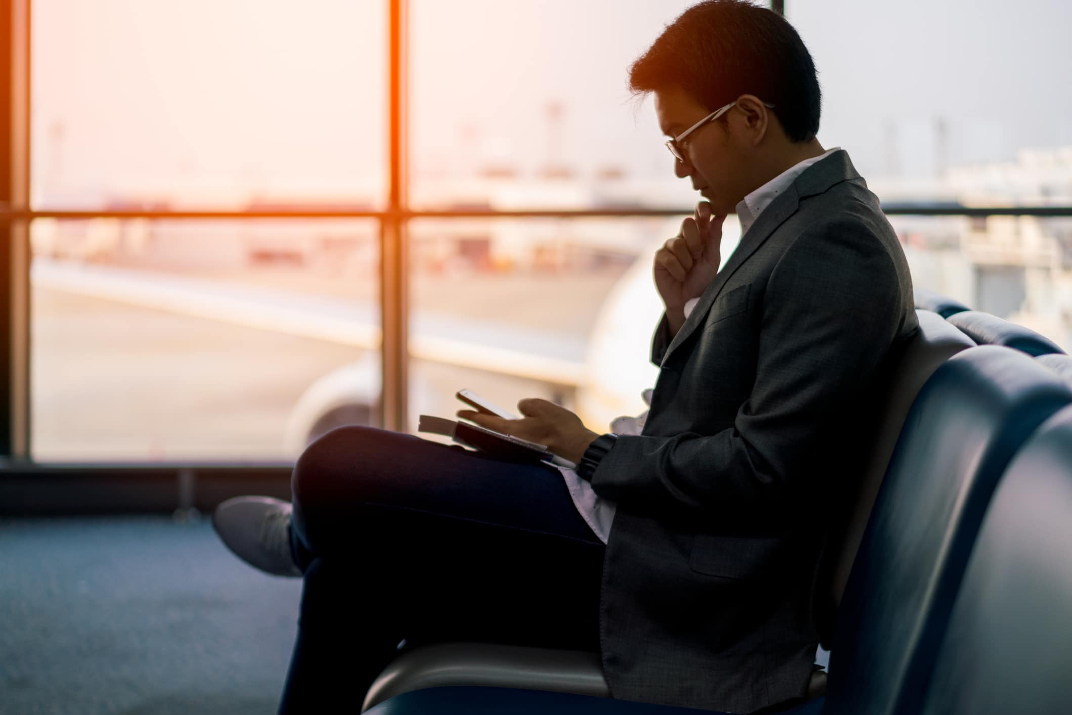 young businessman waiting at an airport