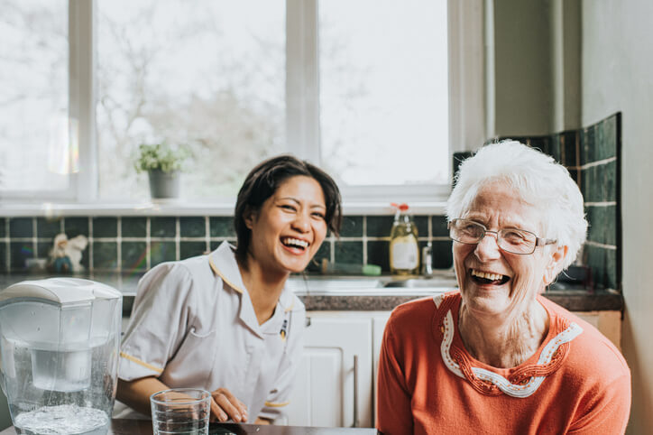 a patient and a healthcare assistant