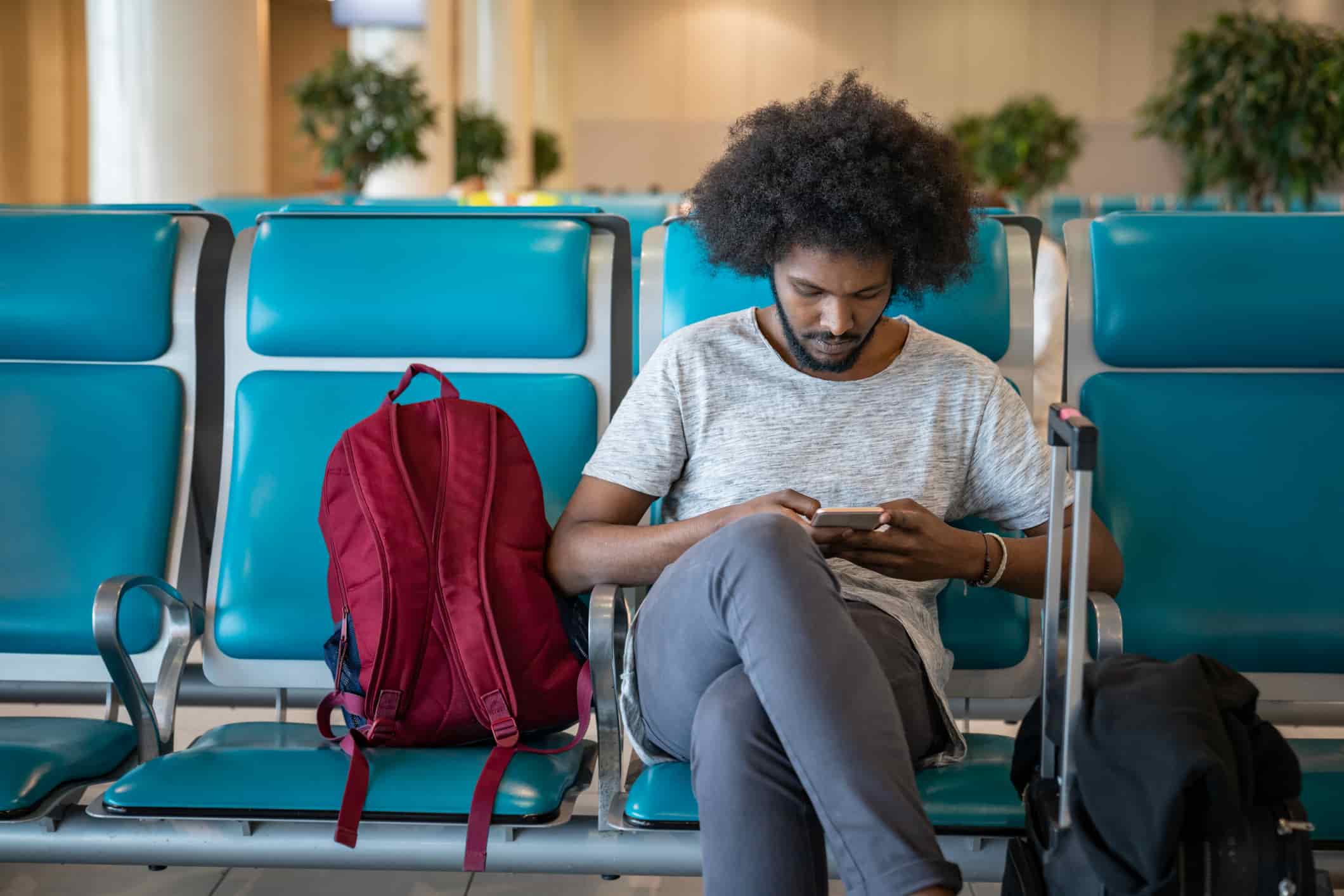 traveller waiting at an airport