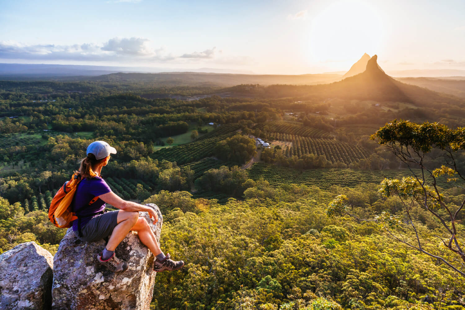 a tourist looking at a natural landscape