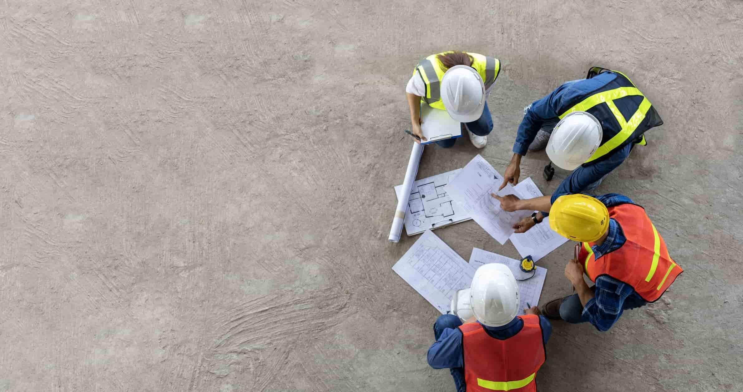 construction workers discussing work-related issues at a construction site